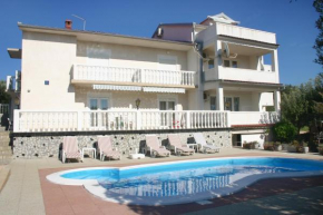  Seaside apartments with a swimming pool Barbat, Rab - 4951  Раб